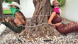 Crook Girls Tied Tight. Two Powerless Cowgirls Cleave Gagged to a Tree and Rough Ropes Hogtie