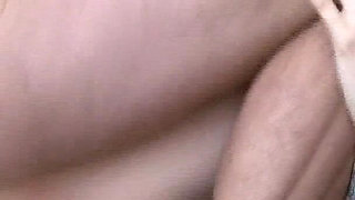 Tattooed Brunette Gets Fingered on the Couch and Cums Hard