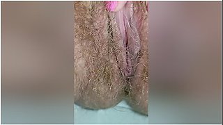 Detailed Close-up Footage Of A Hairy Pussy Girl Urinating From Her Pee Hole And Farting Loudly