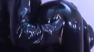Latex Masters Dominate in Intense Rubber Bondage Play