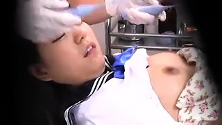 Dazzling Asian teen gets used by horny doctors on hidden cam