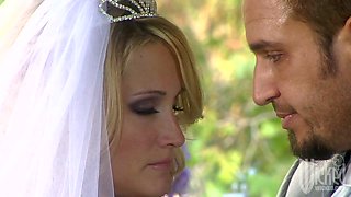 Delicious blond bride Nicole Ray is blowing big cock after wedding