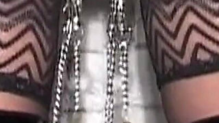 Insatiable MILF in Latex Gets Her Pierced Lips Teased