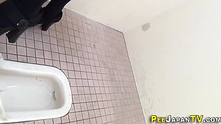Japanese hotties pissing in bathroom