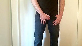 Teasing my cock and balls in jeans