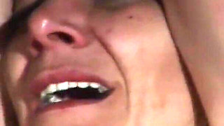 Blonde Girl Has Weights Attached to Her Feet and Is Hoisted up for Whipping