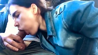 Naughty brunette teen gives a wonderful blowjob in the car