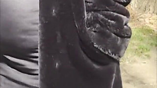 Julie Walking Through a Car Park Wearing Fur Coat, See Her Bound Tits Sticking Out
