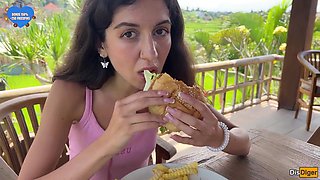 Cute Girl Eating Burger With Cum On Her Face In Public Cafe