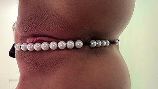Pearl Thong in Shaved Pussy Close up