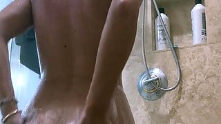 Ambie Bambii Moans While Masturbating With Shower Head