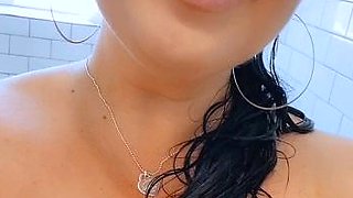 Busty curly brunette with big boobs fucks on couch