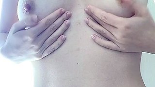 Small titted brunette teen fingering on the bed