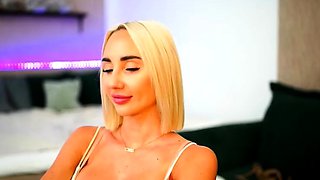 Blonde mature with big boobs masturbates in bed