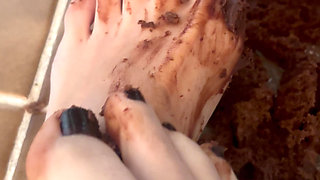 Destroying chocolate cake with my feet