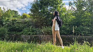 Naked Outdoors Spreading Legs and Pissing