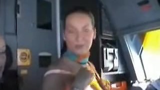 french stewardess exposes her big tits in the cockpit